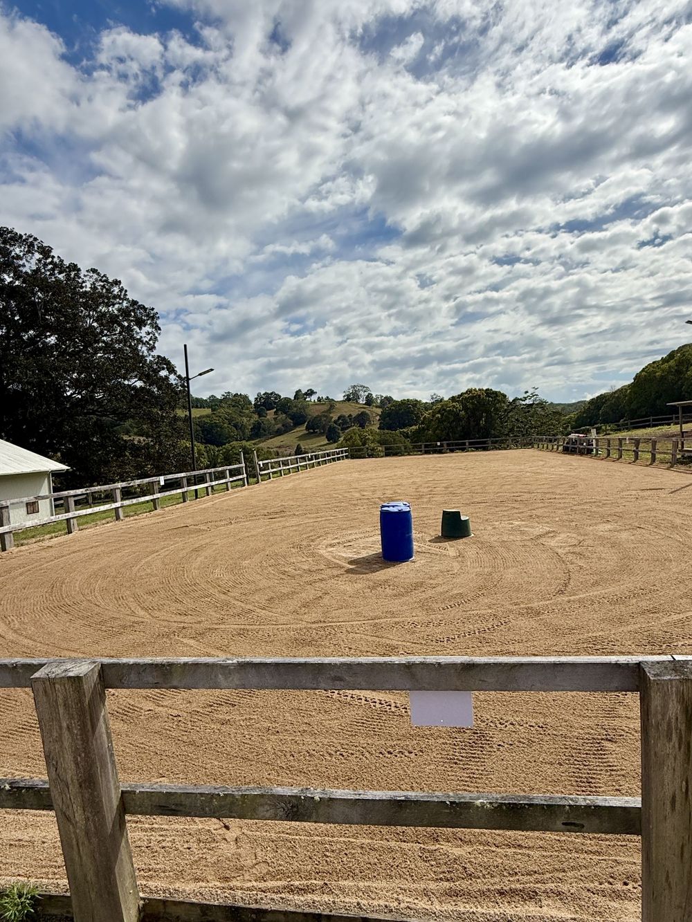 Sand arena with barrels