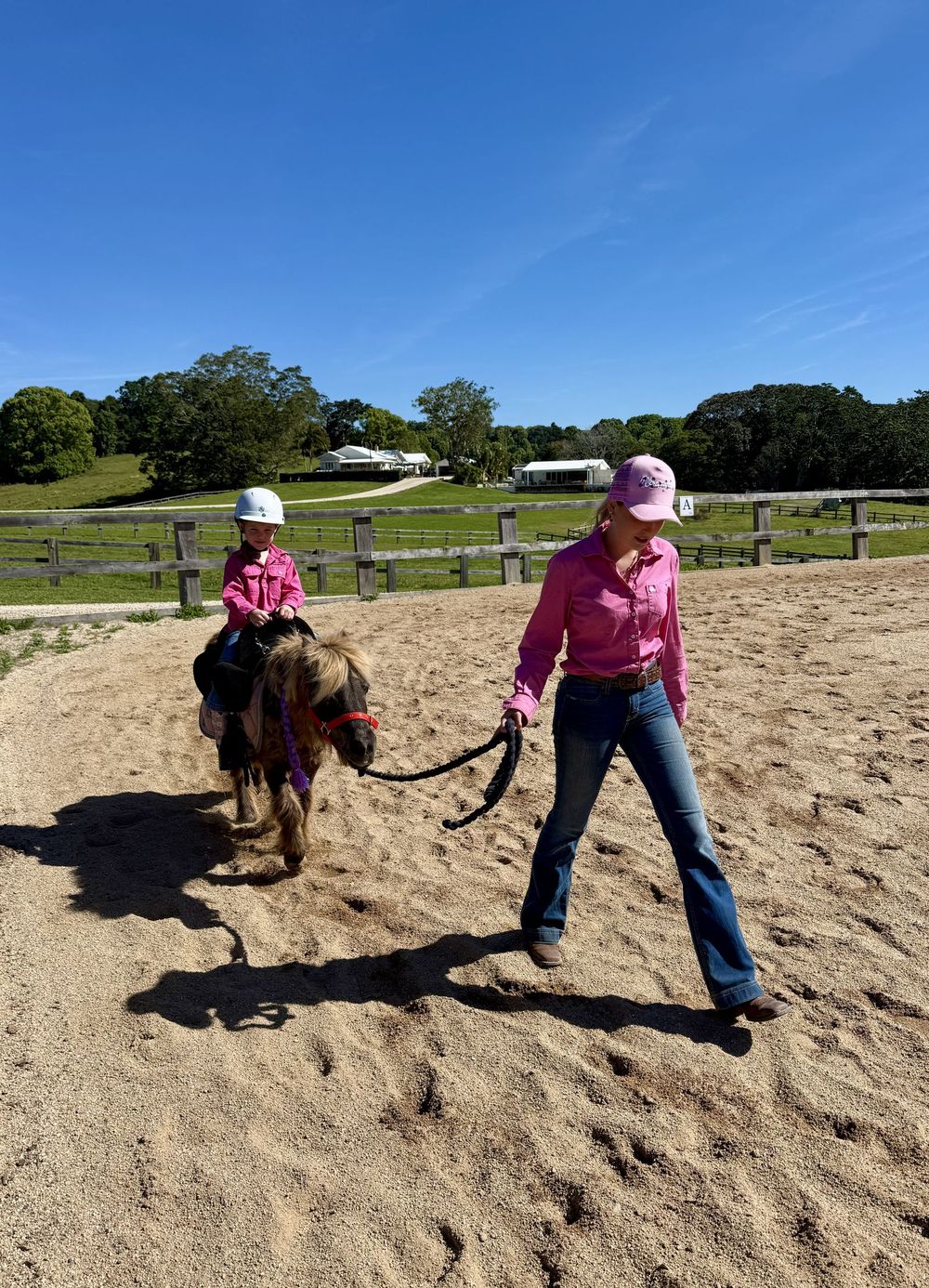 Child on a pony being led