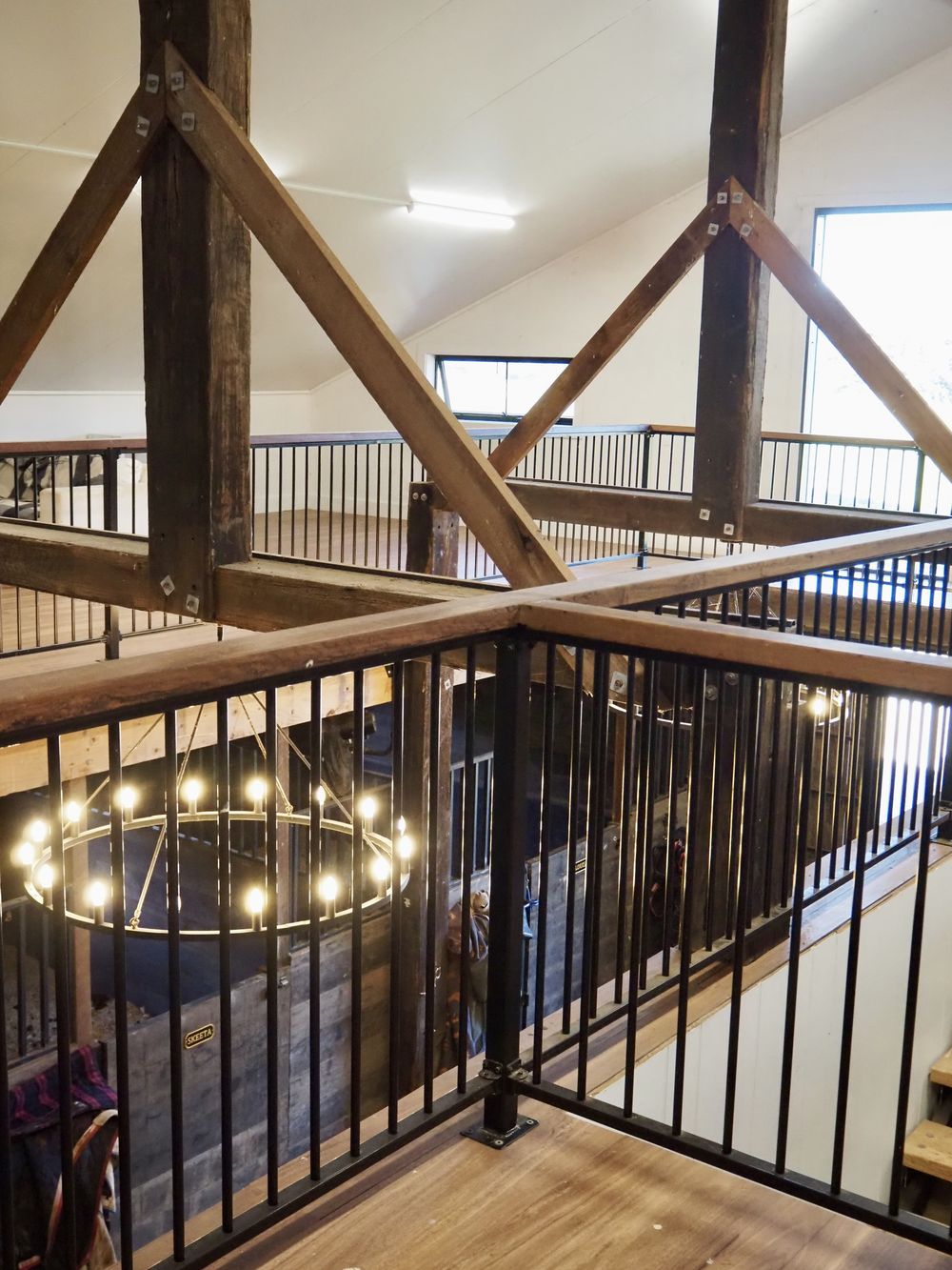 Barn loft with exposed timber trusses